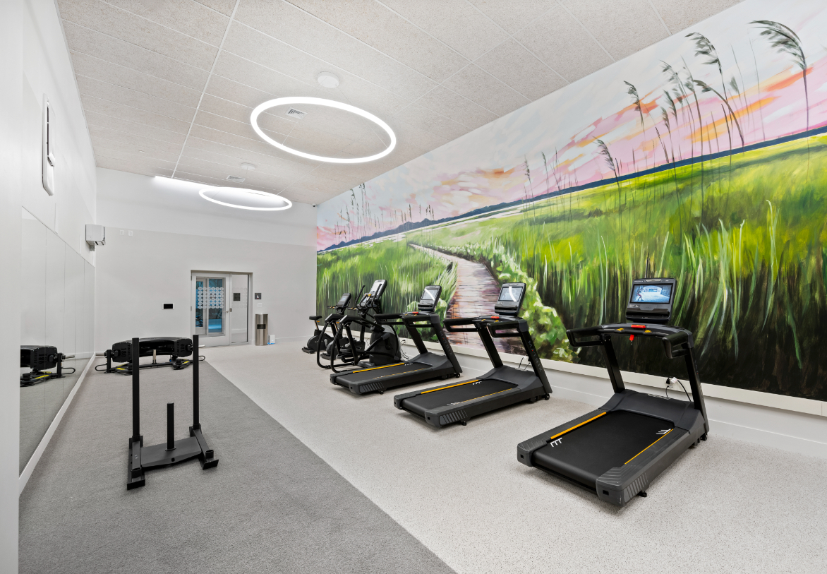 Cardio workout area with advanced machines.